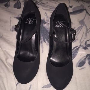 Black suede closed toe pumps